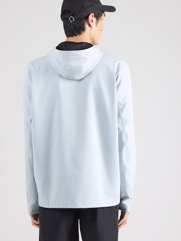 UNDER ARMOUR Urheilutakki 'Unstoppable' värissä sininen