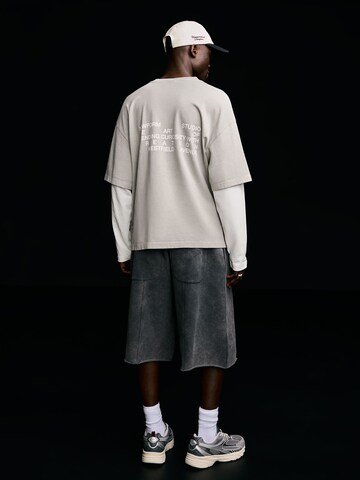 Bershka Loosefit Byxa i svart