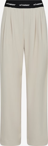 Pantalon ' Amina' co'couture en beige : devant
