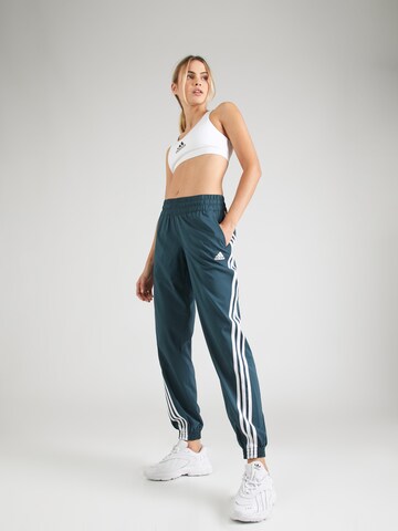 ADIDAS SPORTSWEAR Tapered Sportsbukser i blå