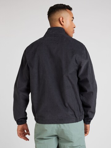 juoda Nike Sportswear Demisezoninė striukė 'CLUB HARRINGTON'