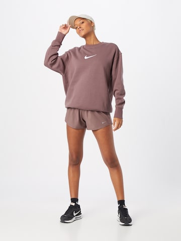 NIKE Regular Sportbroek in Lila