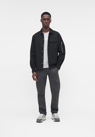 ALPHA INDUSTRIES Between-season jacket 'Combat' in Black