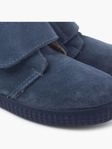 Pisamonas - Bota em azul