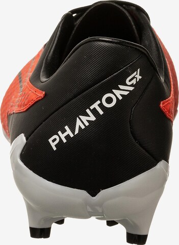 Scarpa da calcio 'Phantom GX Academy' di NIKE in rosso