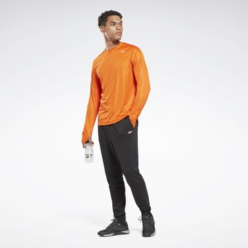 T-Shirt fonctionnel Reebok en orange