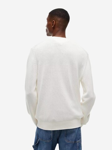 Pull-over Tommy Jeans en blanc