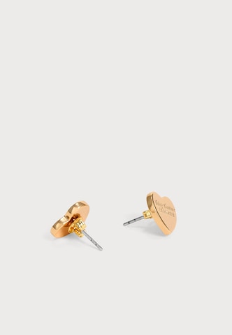Orecchini di Juicy Couture in oro: frontale