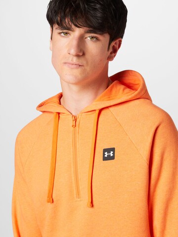 UNDER ARMOUR Sweatshirt in Orange