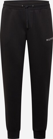 TOMMY HILFIGER Tapered Trousers in Black: front