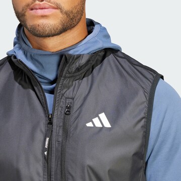 Gilet de sport 'Own the Run' ADIDAS PERFORMANCE en gris