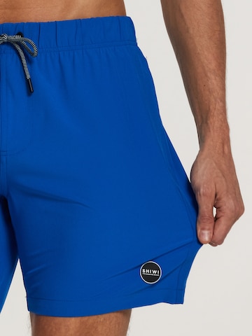 Shiwi Board Shorts 'easy mike solid 4-way stretch' in Blau
