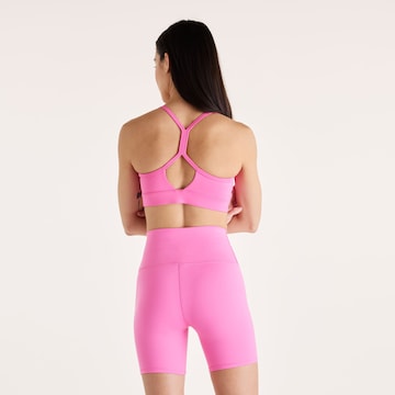 new balance - Bustier Sujetador deportivo 'Essential' en rosa