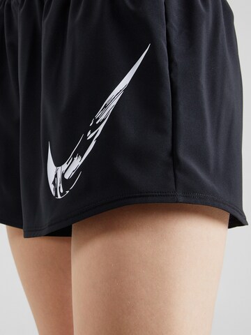 Largi Pantaloni sport 'ONE' de la NIKE pe negru