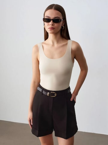 Top di Dilvin in beige