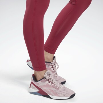 Skinny Pantaloni sportivi 'Lux' di Reebok in rosa