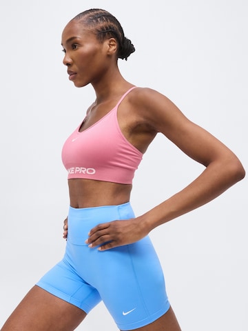 NIKE - Soutien Bustier Soutien de desporto 'Nike Pro' em rosa