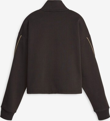 PUMA Sportief sweatshirt 'ESS+ MINIMAL' in Zwart