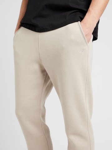 HOLLISTER Tapered Trousers in Brown