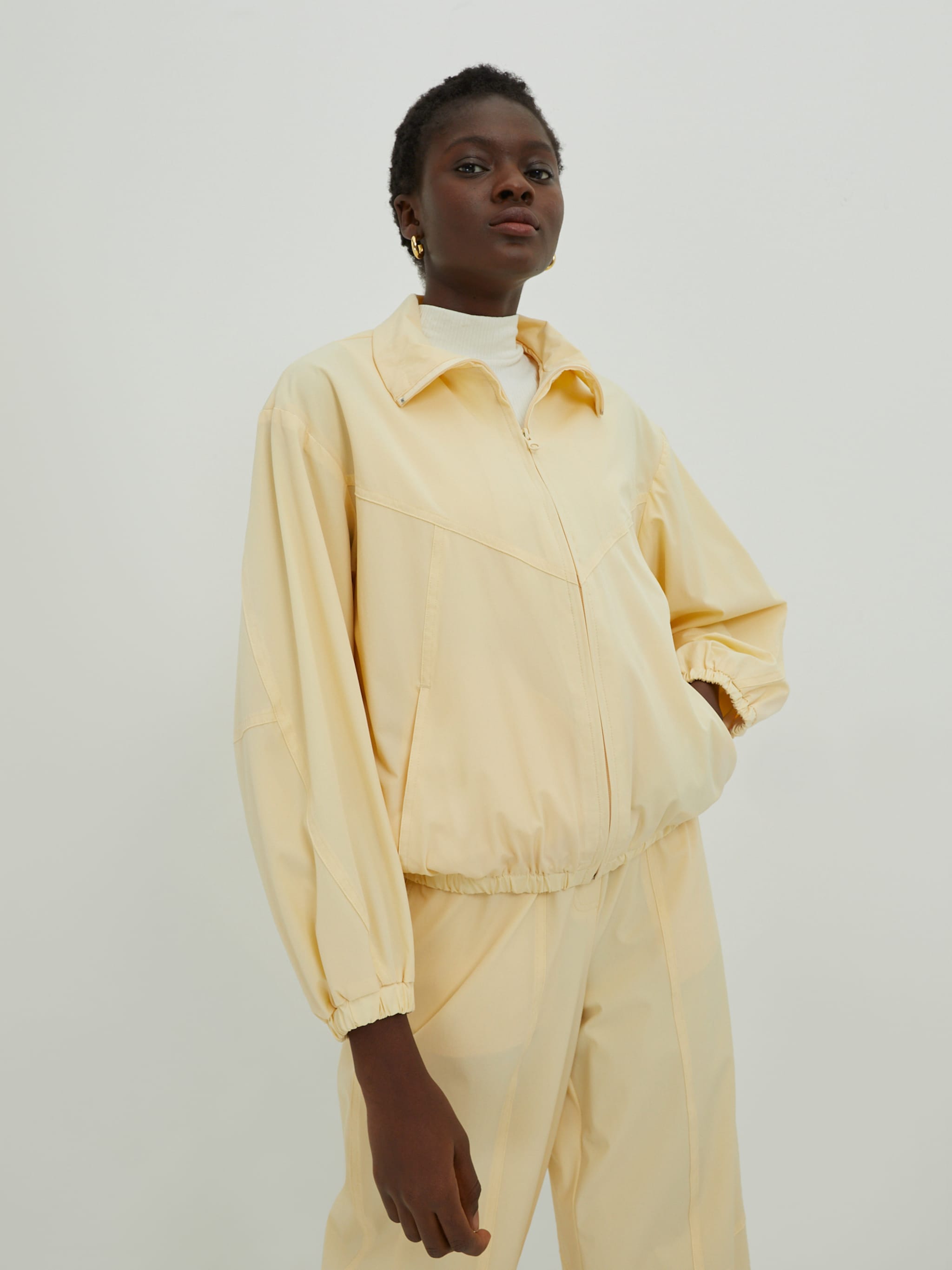 EDITED Producten Tussenjas 'Kori' Beige