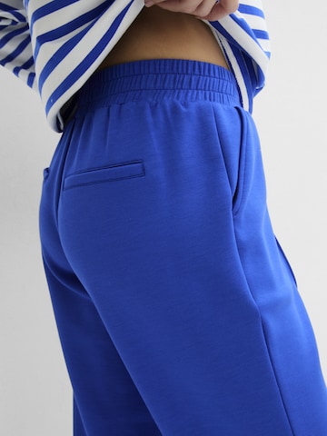bonprix Tapered Hose in Blau