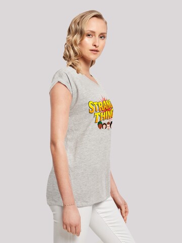T-shirt 'Stranger Things Comic Heads Netflix TV Series' F4NT4STIC en gris