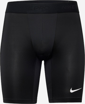 Skinny Pantalon de sport NIKE en noir : devant