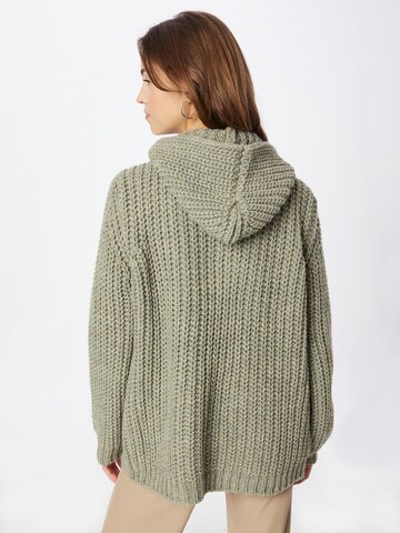 Cardigan Cartoon en vert