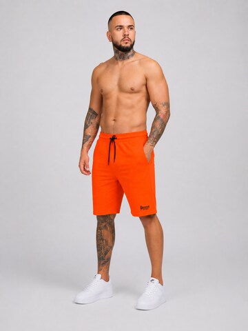 Boxeur des Rues - regular Pantalón deportivo 'Herren Baumwollshorts Boxeur des Rues, Orange, Schwarzes Logo' en naranja
