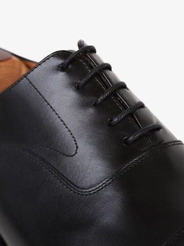 Chaussure à lacets Scalpers en noir