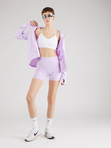 NIKE Skinny Spodnie sportowe 'One' w kolorze fioletowy