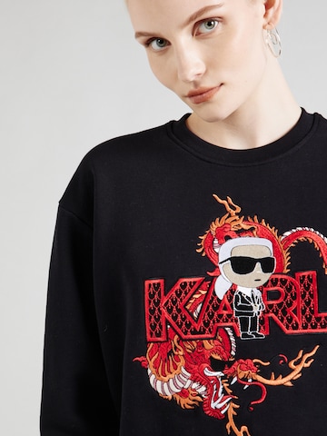 juoda Karl Lagerfeld Megztinis be užsegimo 'ikonik lny'