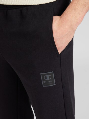 Champion Authentic Athletic Apparel Tapered Trousers in Black