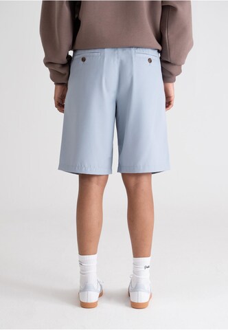 Prohibited Regular Pleat-Front Pants in Blue