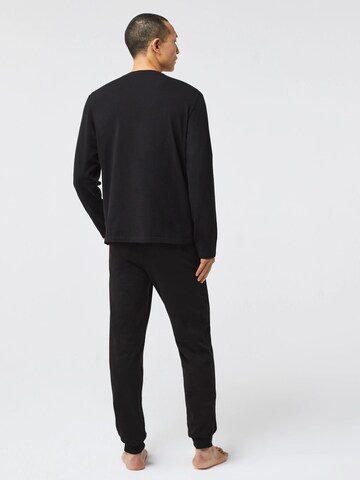 Tricou de la LACOSTE pe negru