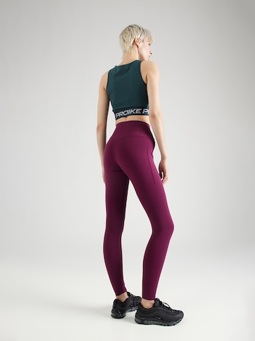 NIKE Skinny Workout Pants 'UNIVER' in Red