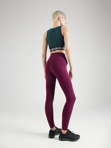 NIKE Skinny Sportbroek 'UNIVER' in Rood