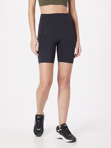 On Skinny Trousers in Black: front