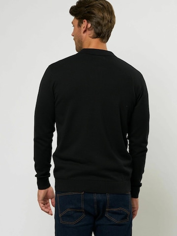 U.S. POLO ASSN. Neulepaita 'Rocky' värissä musta