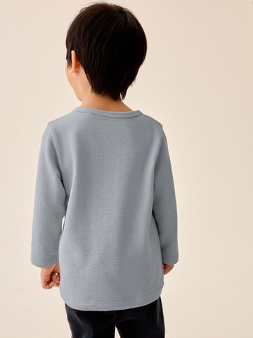 Next - Camiseta en azul