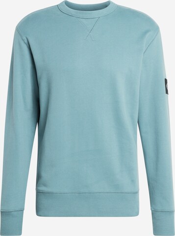 Sweat-shirt Calvin Klein Jeans en bleu : devant