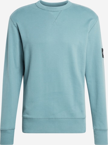 Sweat-shirt Calvin Klein Jeans en bleu : devant