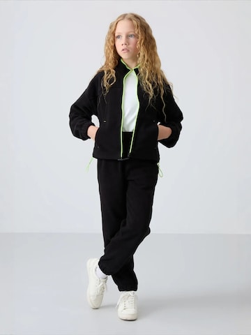 Tommy Life Bluzka sportowa w kolorze czarny