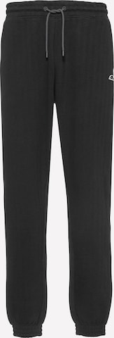 ELLESSE Tapered Pants in Black: front