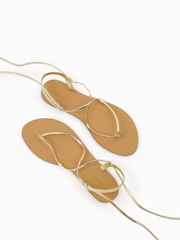 Tongs Bershka en or