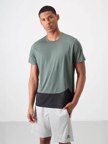 T-Shirt fonctionnel Tommy Life en vert : devant