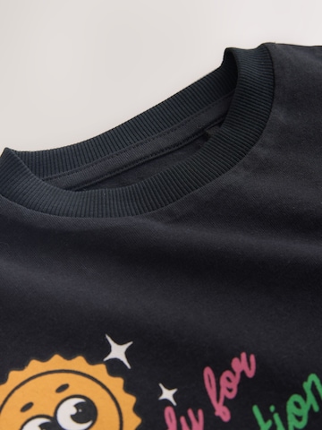 T-Shirt Next en noir