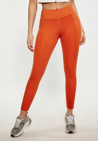 faina Athlsr Skinny Workout Pants in Orange