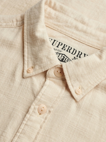 Coupe regular Chemise 'The Merchant Store' Superdry & Co en beige