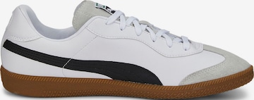 Chaussure de foot 'KING 21' PUMA en blanc